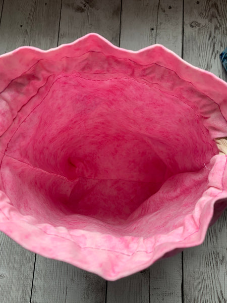 Spa composition with bath accessories in a pink string bag, flat lay. Stock  Photo by puhimec